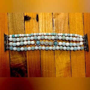 Pastel multicolored beaded Apple Watch band.